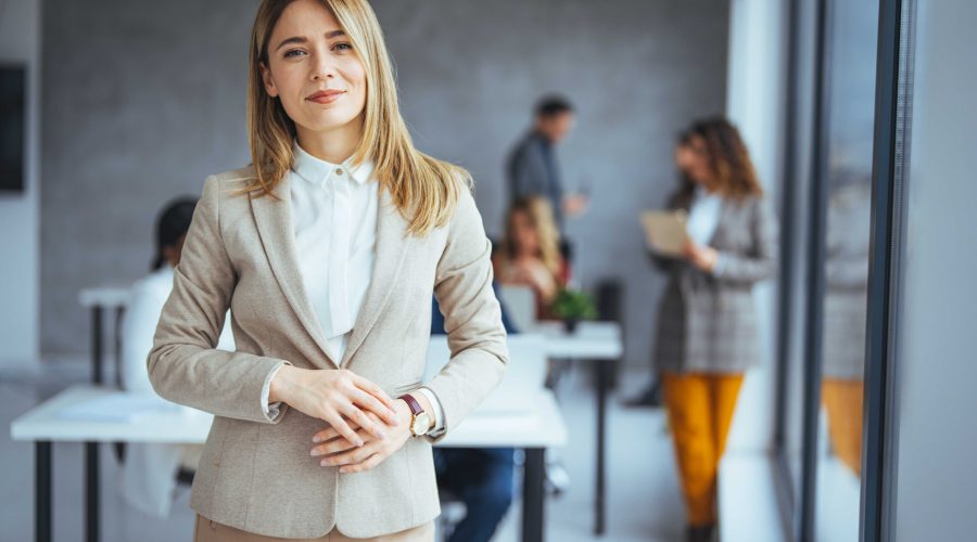 Confident,Young,Businesswoman,Standing,In,A,Modern,Office.,Portrait,Of
